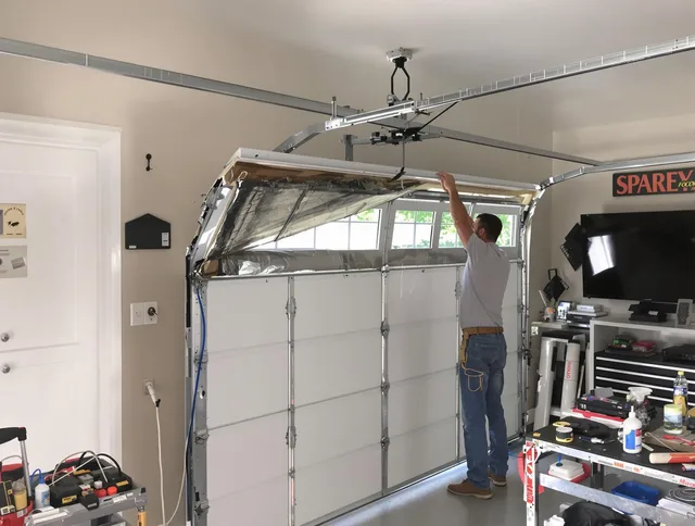 Garage door section replacement by Suffield Garage Door Repair in Suffield