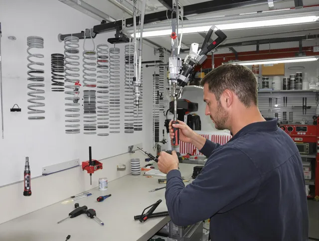 Suffield Garage Door Repair safety certified technician performing precision spring replacement in Suffield