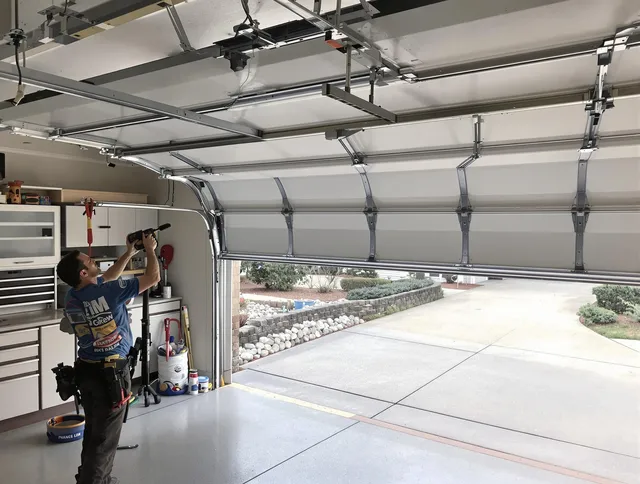 Garage door track repair service by Suffield Garage Door Repair in Suffield